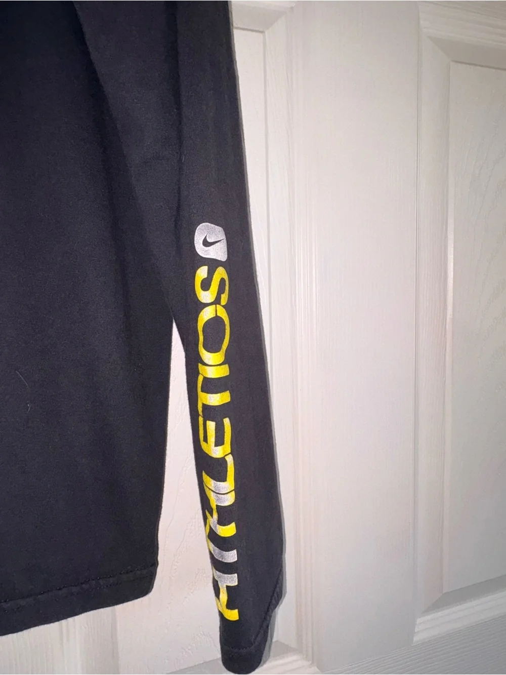 Nike Black Long-Sleeve Tee with Yellow Logo and Sleeve Text